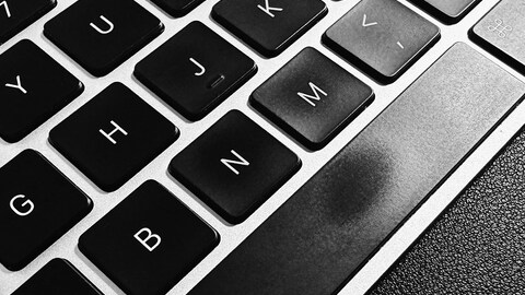 Those Gross Shiny Patches on Your Keyboard Aren’t What You Think