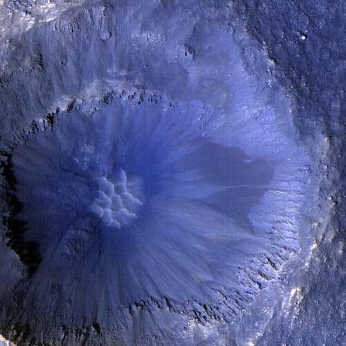 NASA spacecraft spots dramatic view of new impact crater on Mars