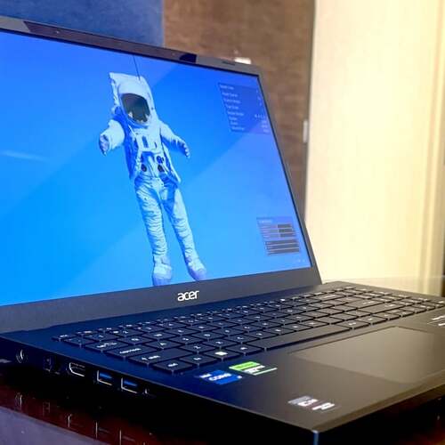 CES 2024: Your eyes aren't deceiving you. Arms are 'sticking out' of this 3D laptop.