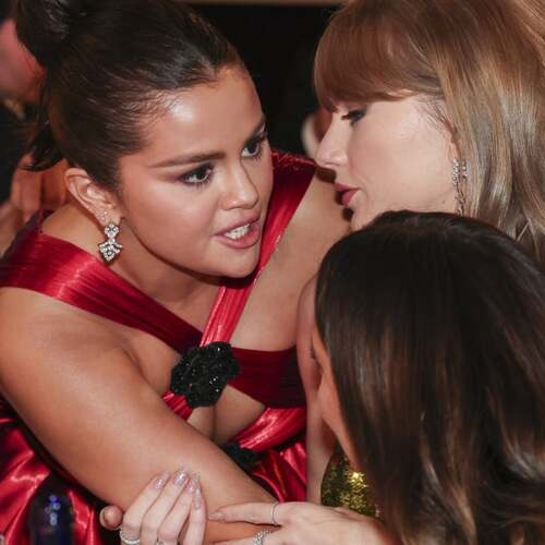 What were Taylor Swift and Selena Gomez gossiping about at the Golden Globes?