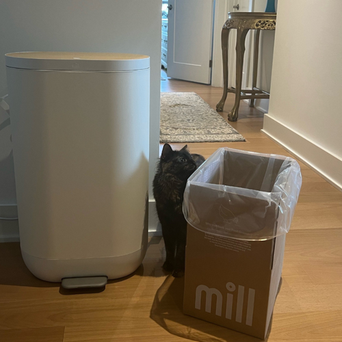 The Mill food recycling bin keeps your kitchen scraps from going to a landfill by feeding them to chickens instead