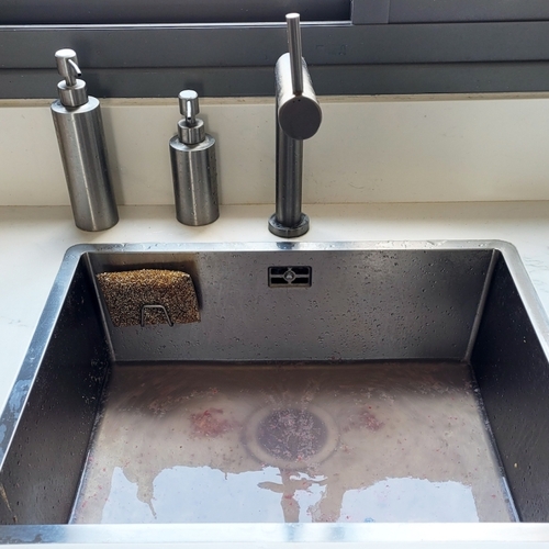 Why Water Is Coming Up Through Your Sink (and How to Fix It)