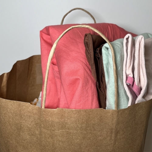 How I Use a Bag in My Closet to Declutter With Less Stress